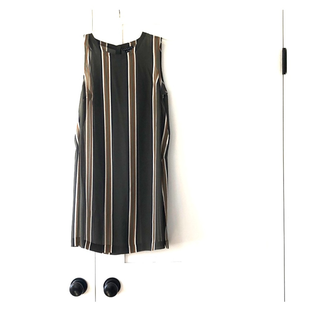 Sheer sleeveless tunic